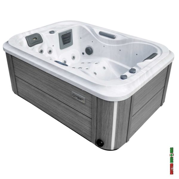 Cocoa Point hot tub with grey side cabinet panels and white acrylic shell