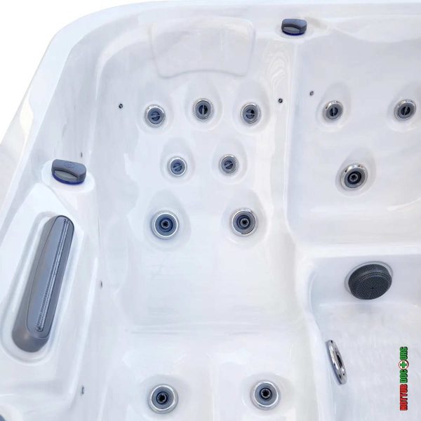 Laguna Deluxe hot tub close up of stainless steel hydrotherapy jets