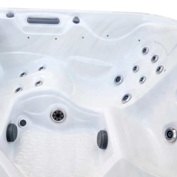 Laguna Deluxe hot tub lounger side view with jets and ergonomic seating