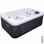 Sundowner Hot Tub. External Photo showing the cabinet and corner view of the internal seats.